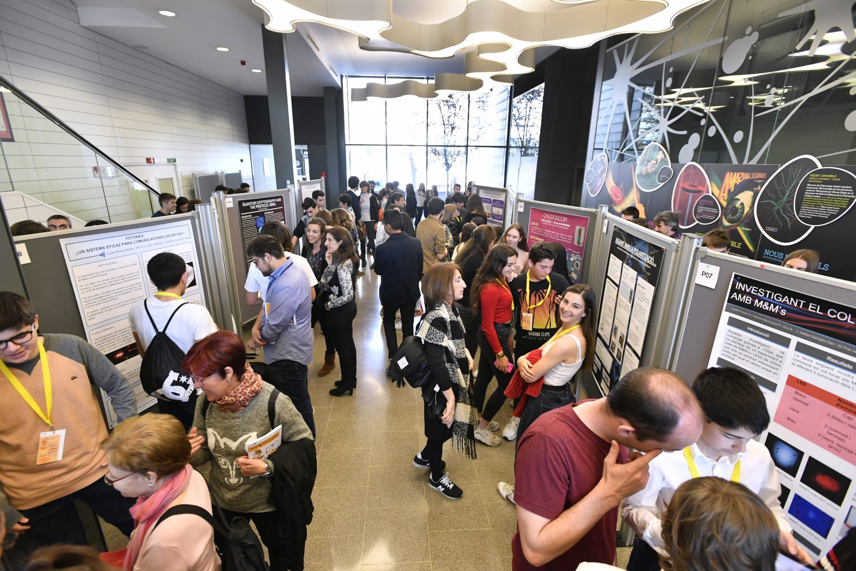 People looking at the posters of the Young Photonics Congress